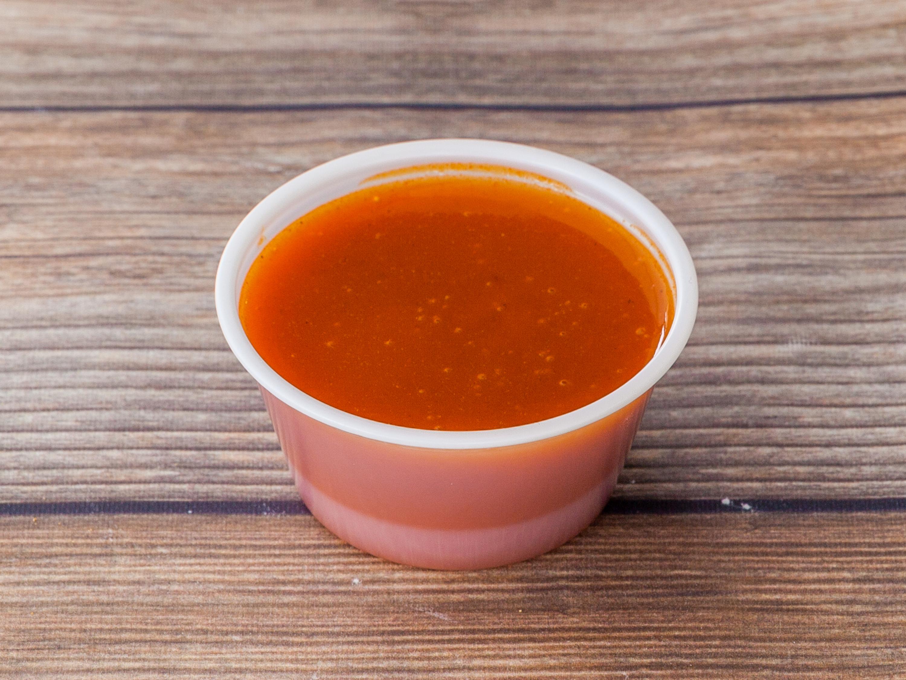 Cup of Buffalo Sauce.