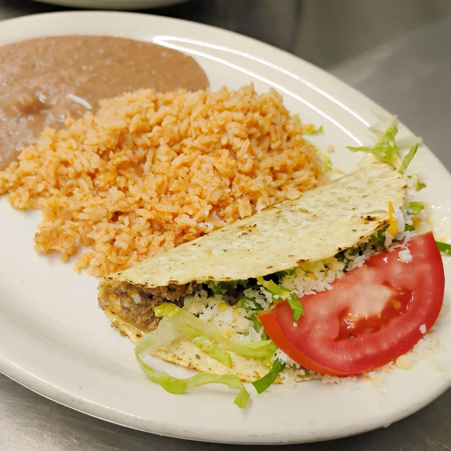 One Crispy Taco, Rice & Beans.