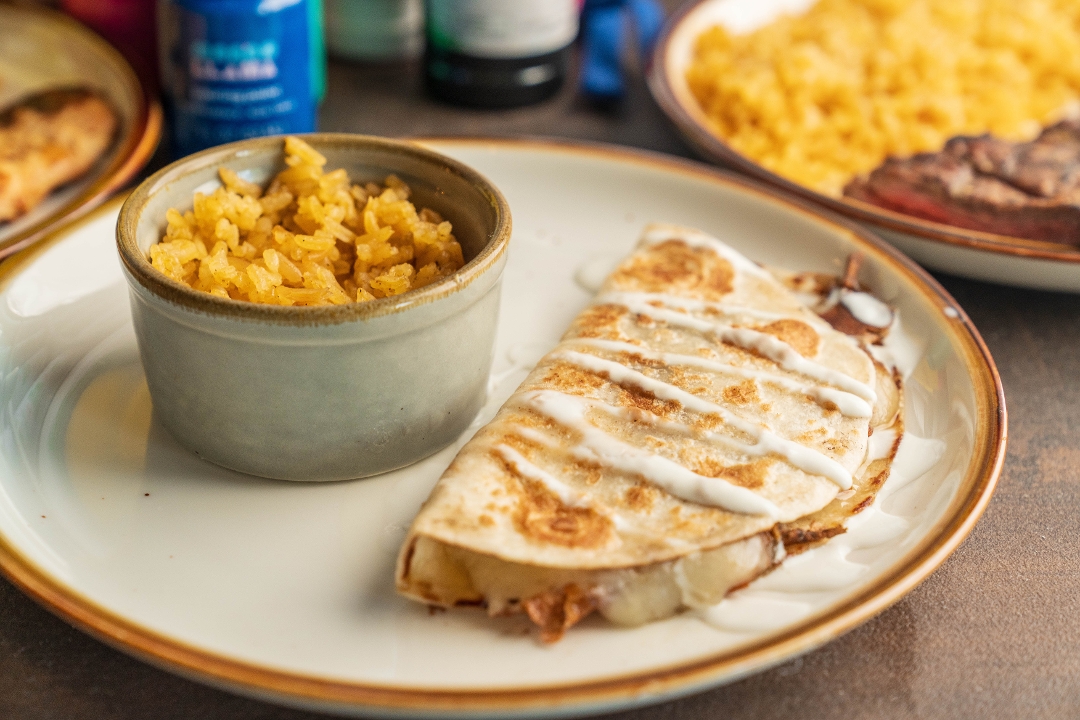 CHEESE QUESADILLA AND RICE.