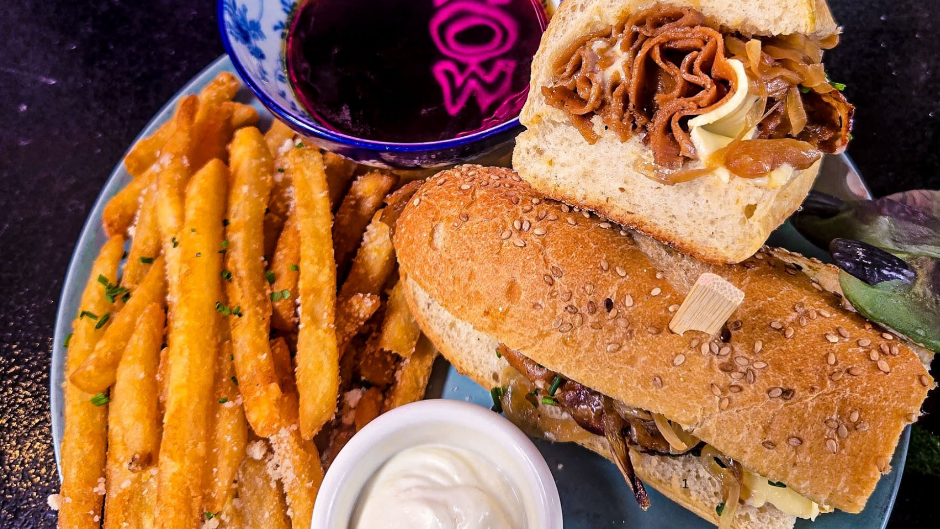 The FRENCH DIP (Served w/ truffle parm fries).