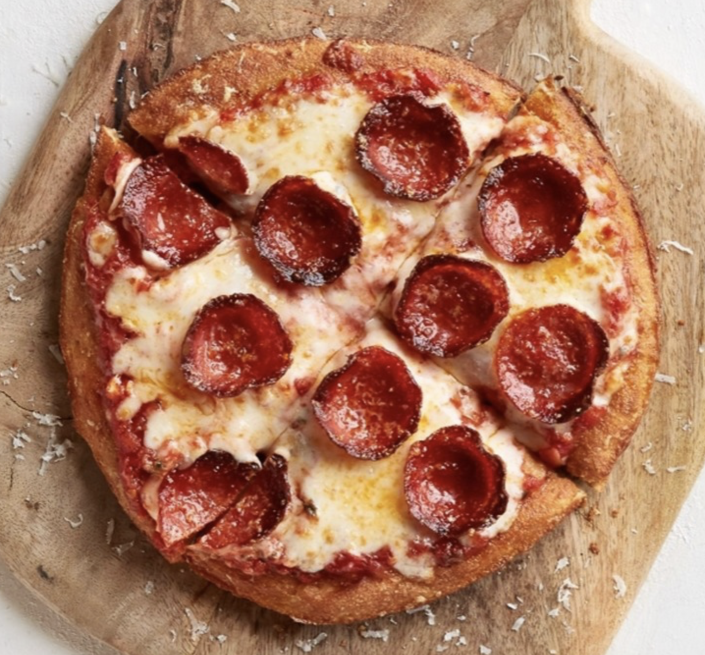 Kids 1-Topping Pizza + Fountain Soda Lunch Special.