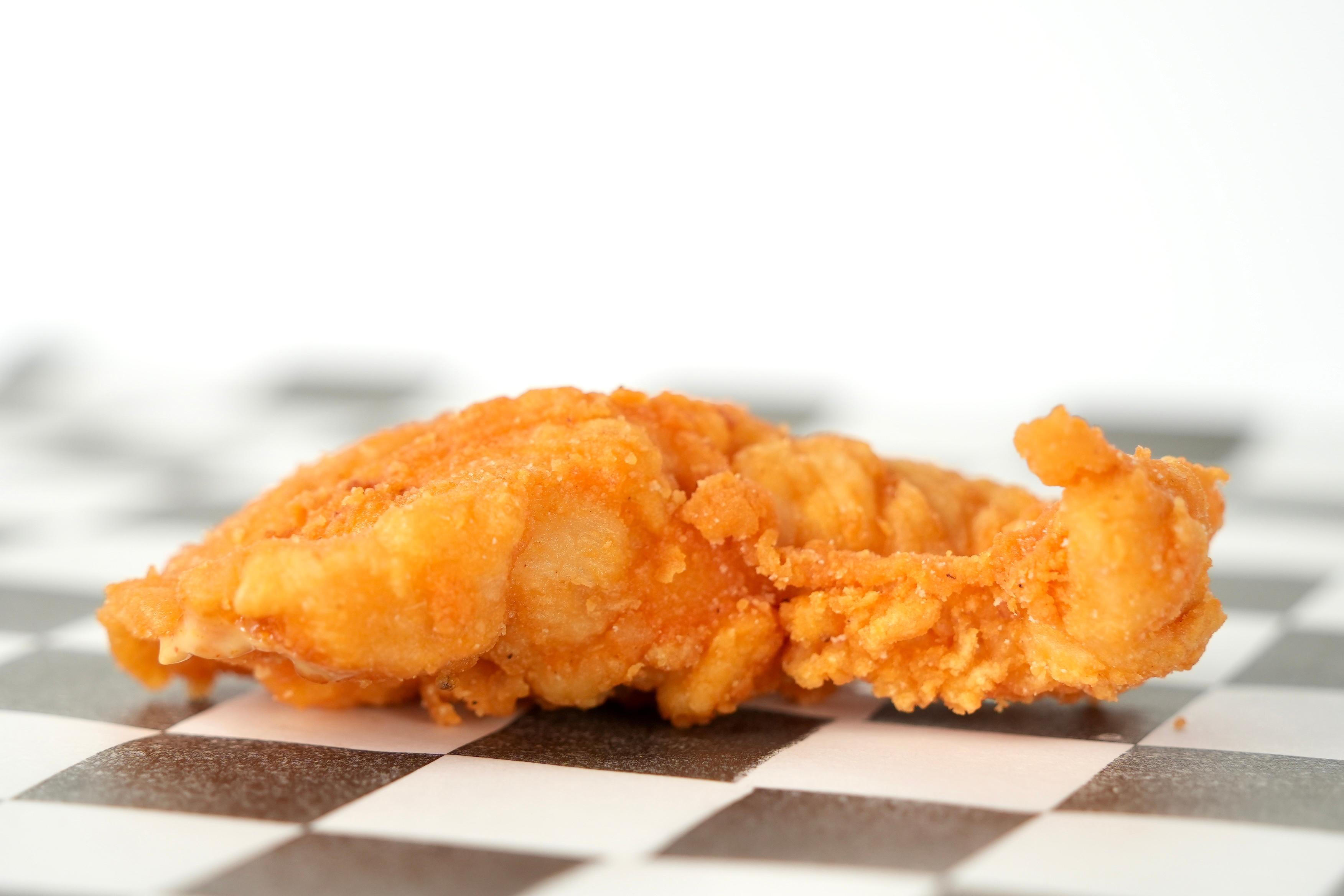 Single Hot Chicken Strip.