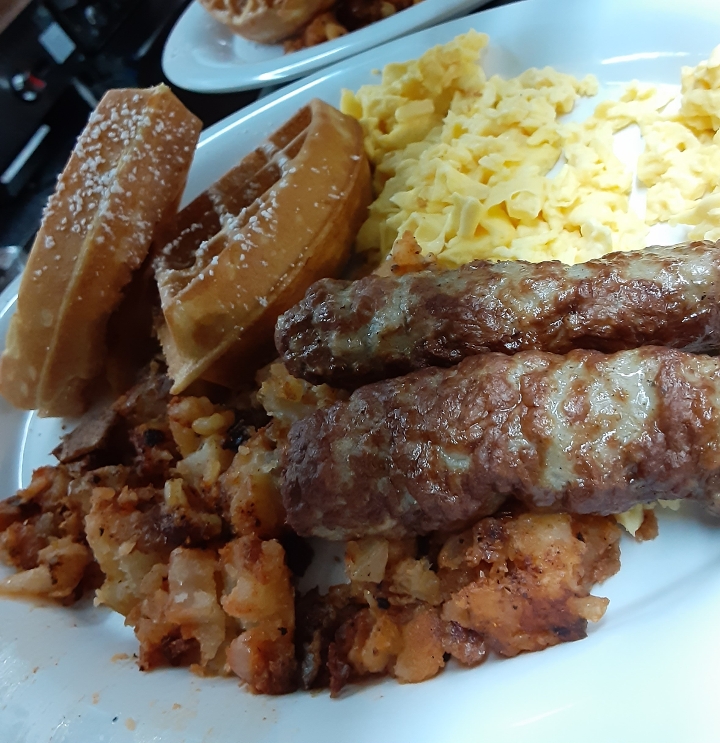 D. Two Large Eggs, Two Mini Waffles, Home Fries and Bacon or Sausage.