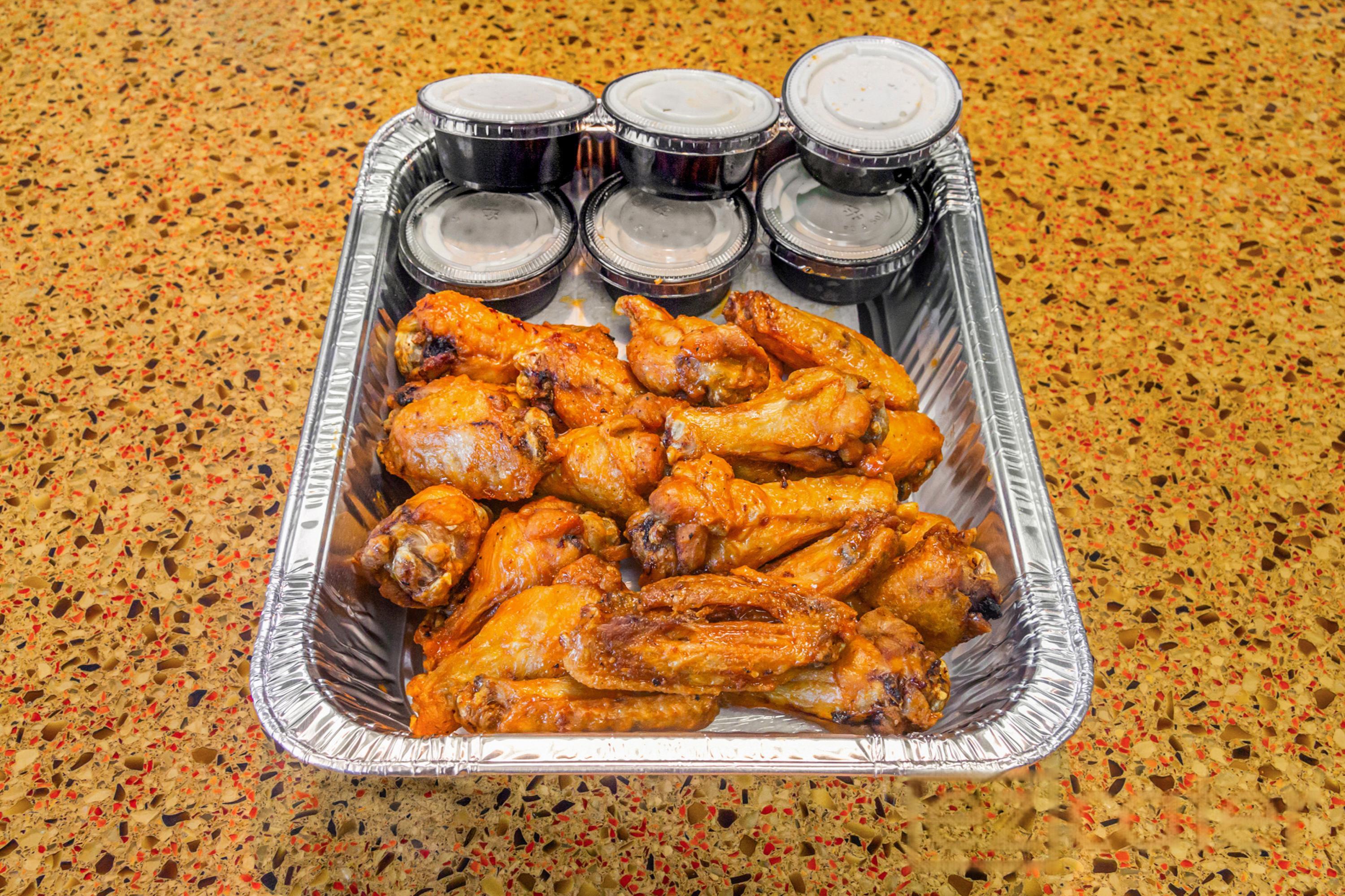 50 Jumbo Bone-In Wings (Serves 15).