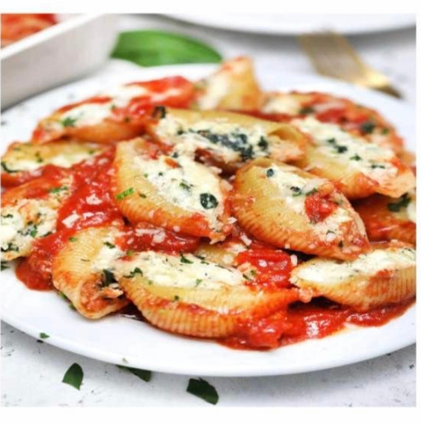 Spinach & Ricotta Stuffed Shells, Mozzarella Cheese, Garlic Bread & Salad.