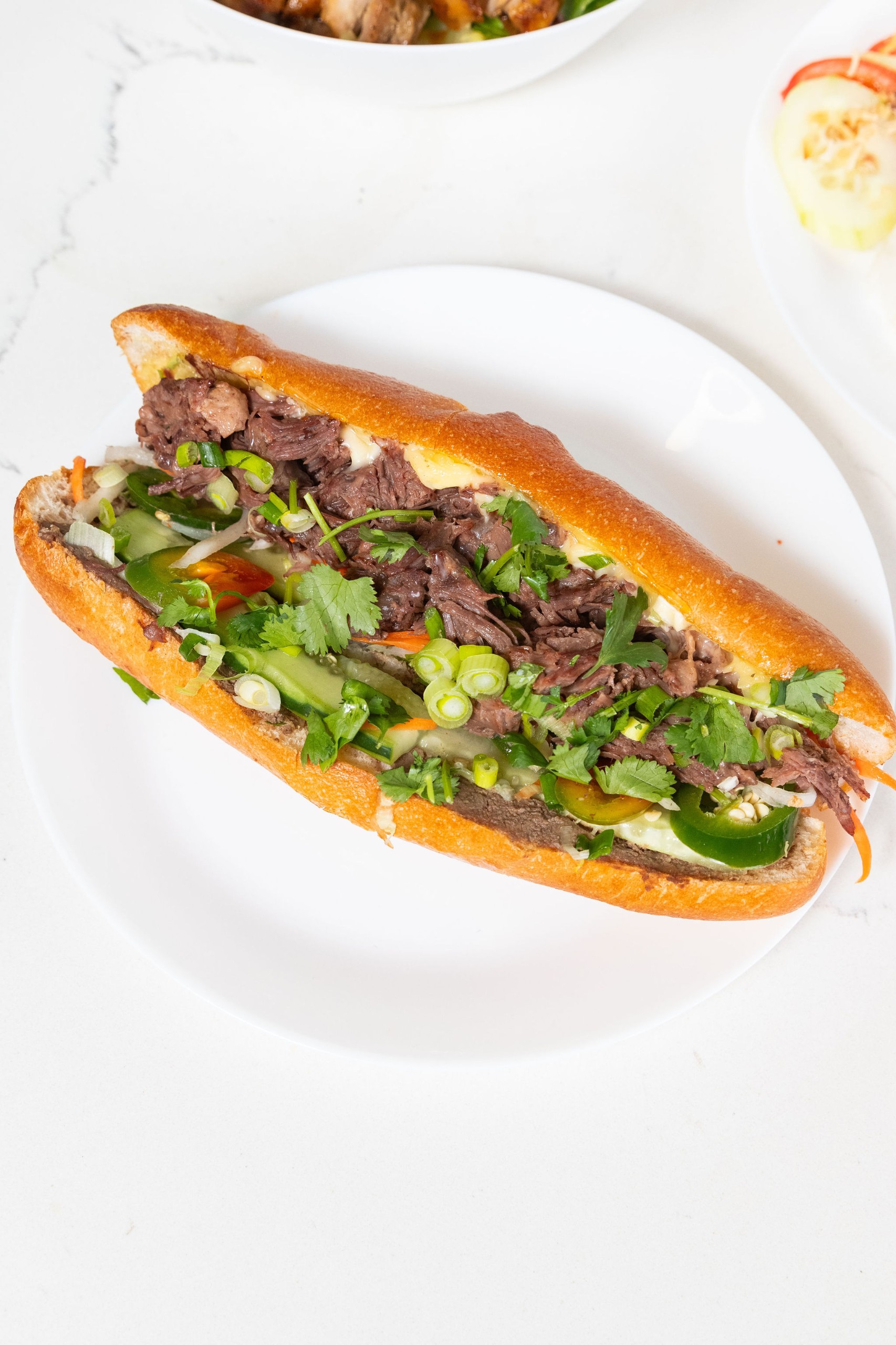 A3. BBH Braised Beef - Bánh Mì Bò Huế.