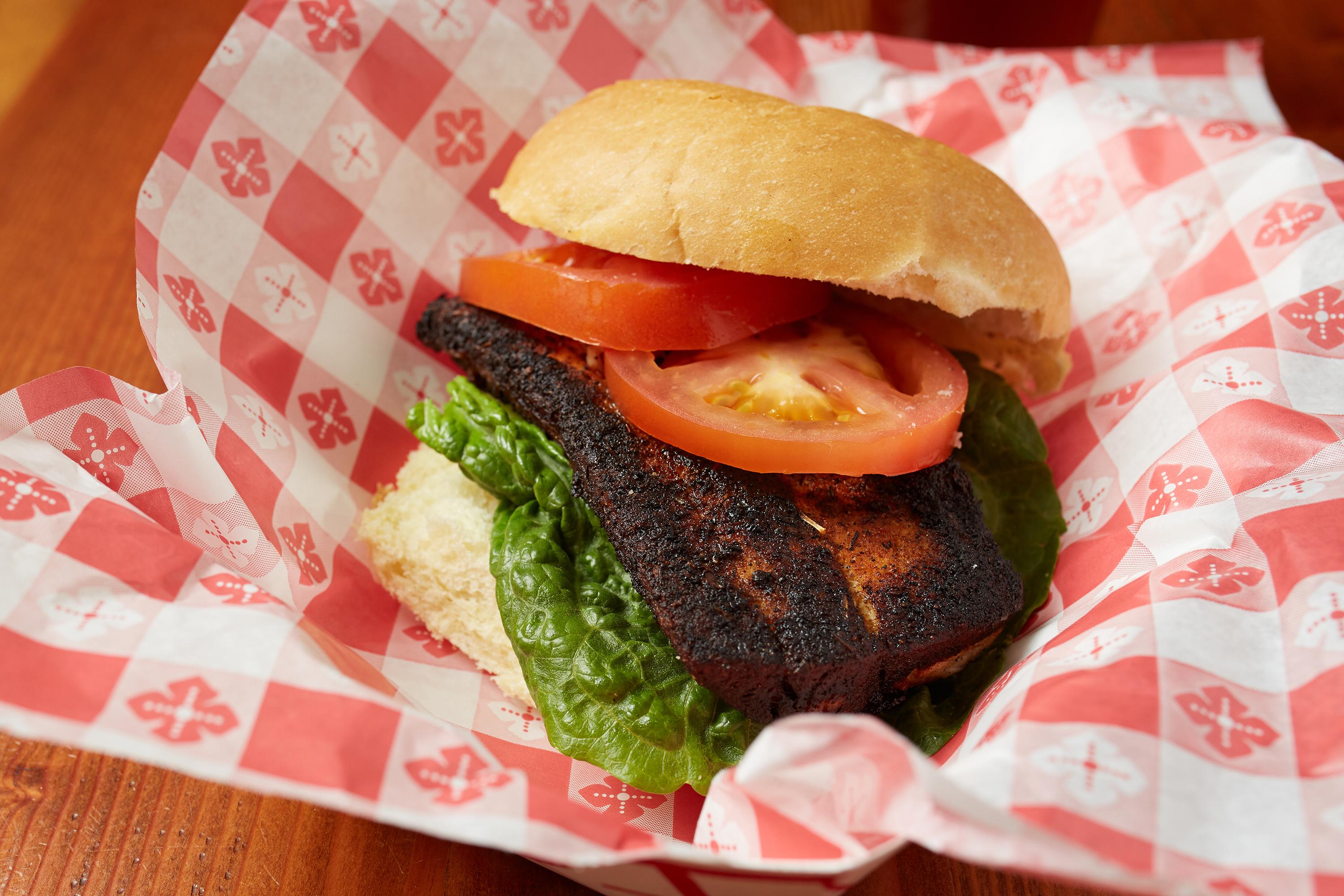 Blackened Mahi-Mahi Sandwich With Chips.