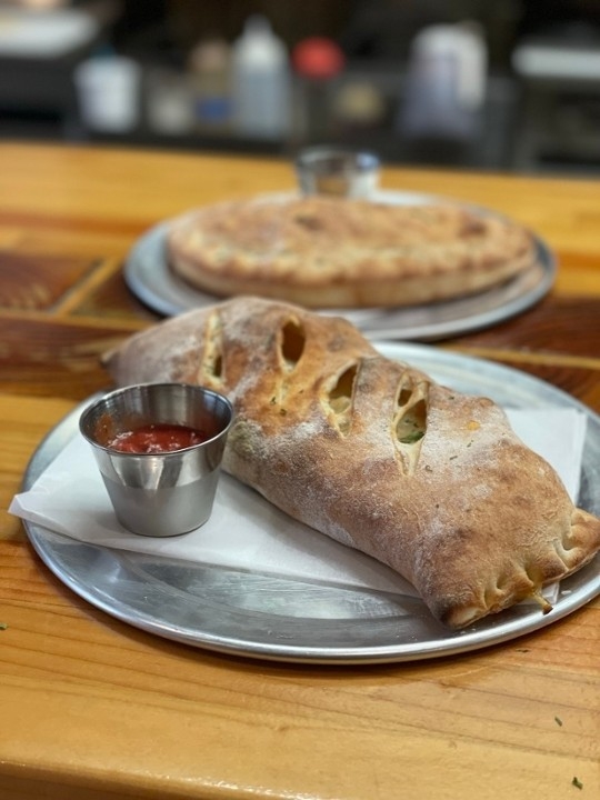 Sauteed Mushroom & Spinach Stromboli.