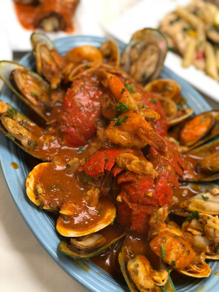 Seafood Colosseum Over Linguine.