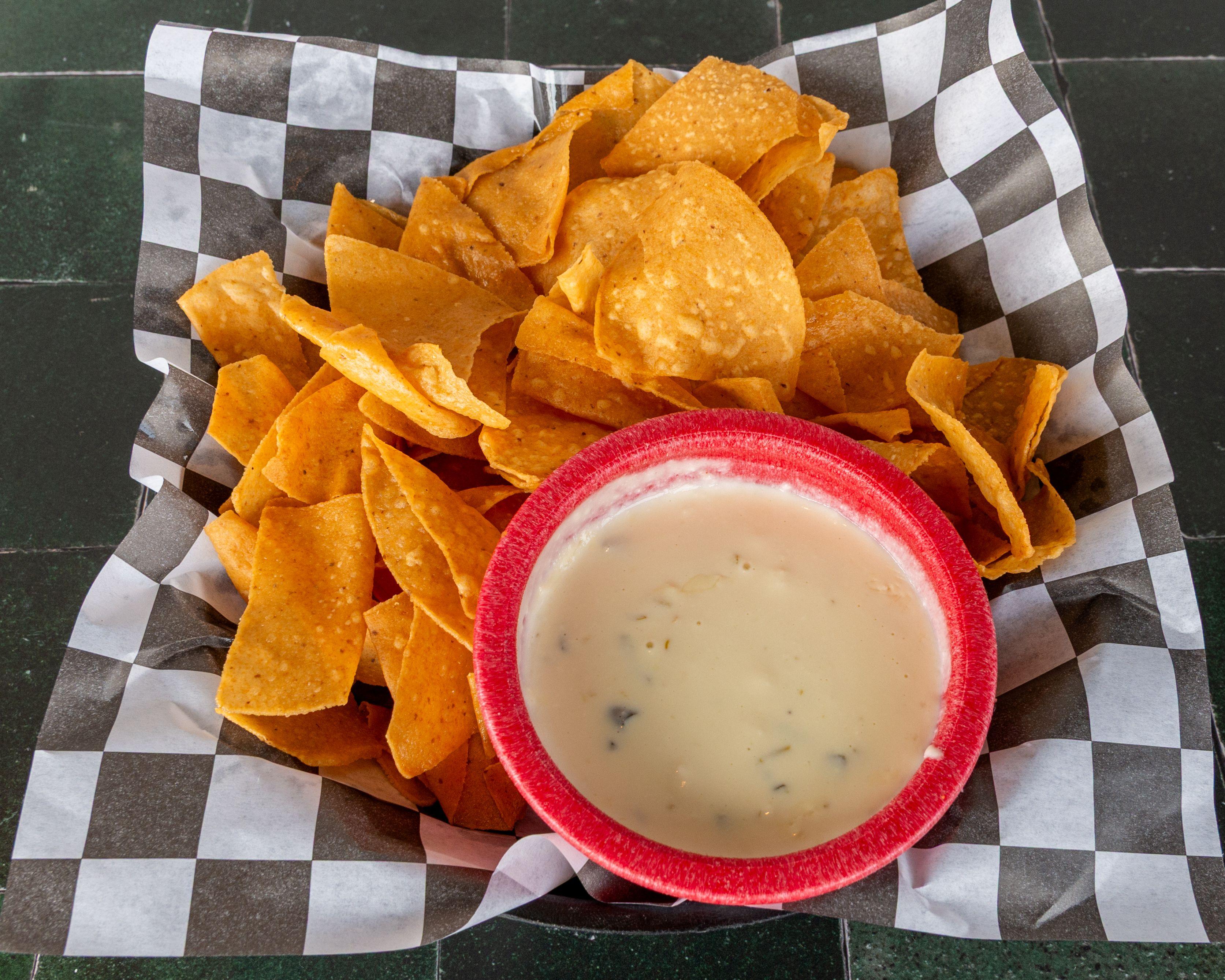 Queso Dip and Nacho Chips.