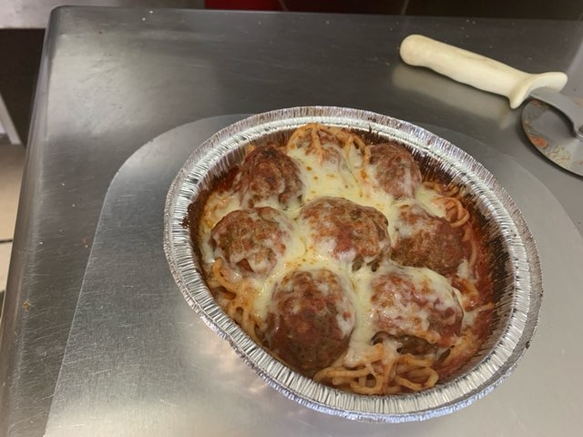 Spagetti & Meatballs w/ Garlic breadsticks.