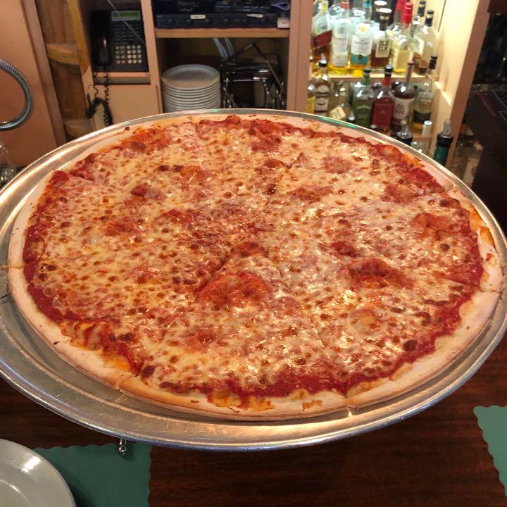 Family Special - 2 Lg Pizza Pies 2LT Soda.