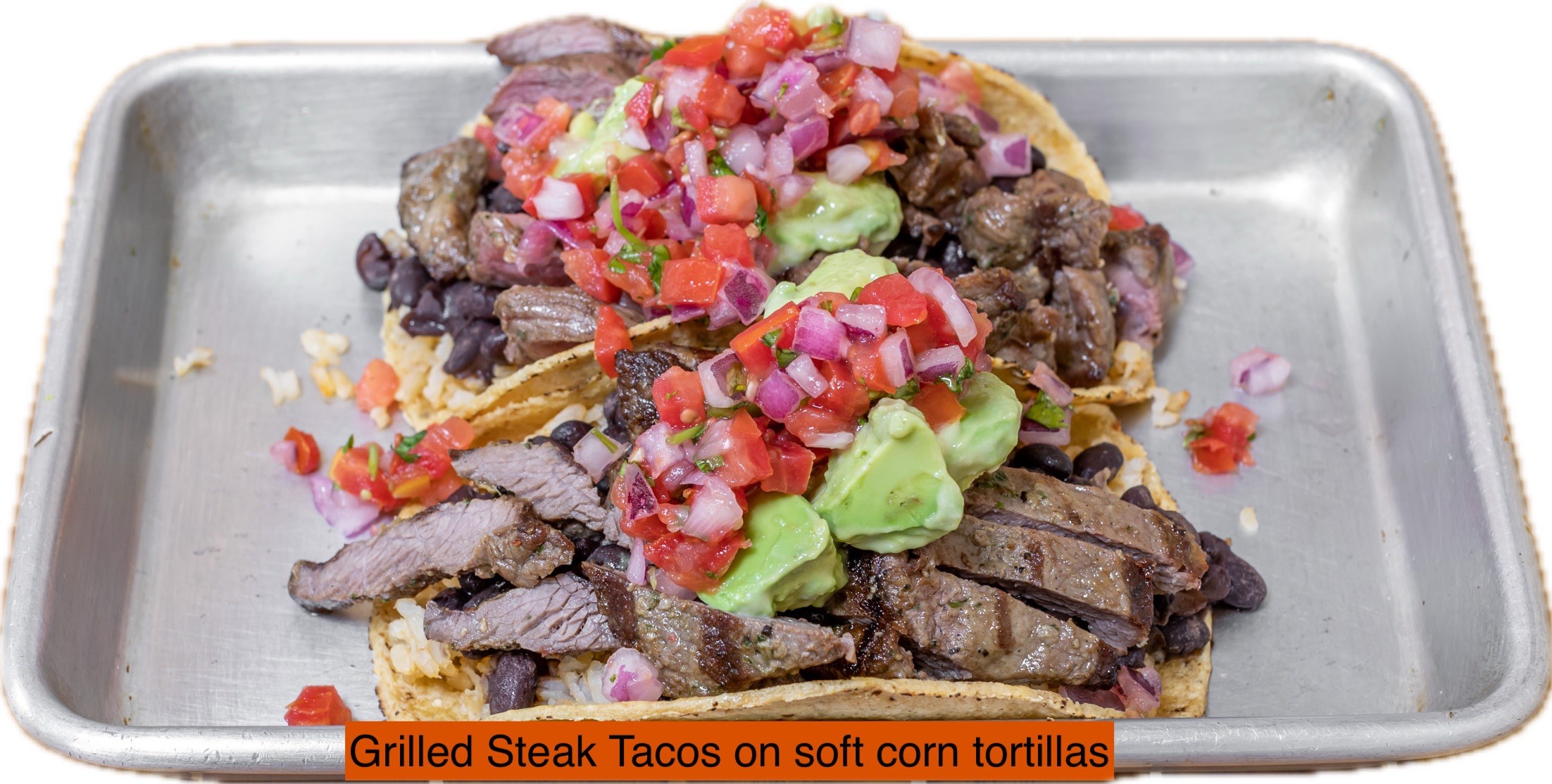 Carne Asada Tacos, 2 Corn Tortillas, Mexican Brown Rice, Black Beans, Pico de Gallo, Avocado Hummus.