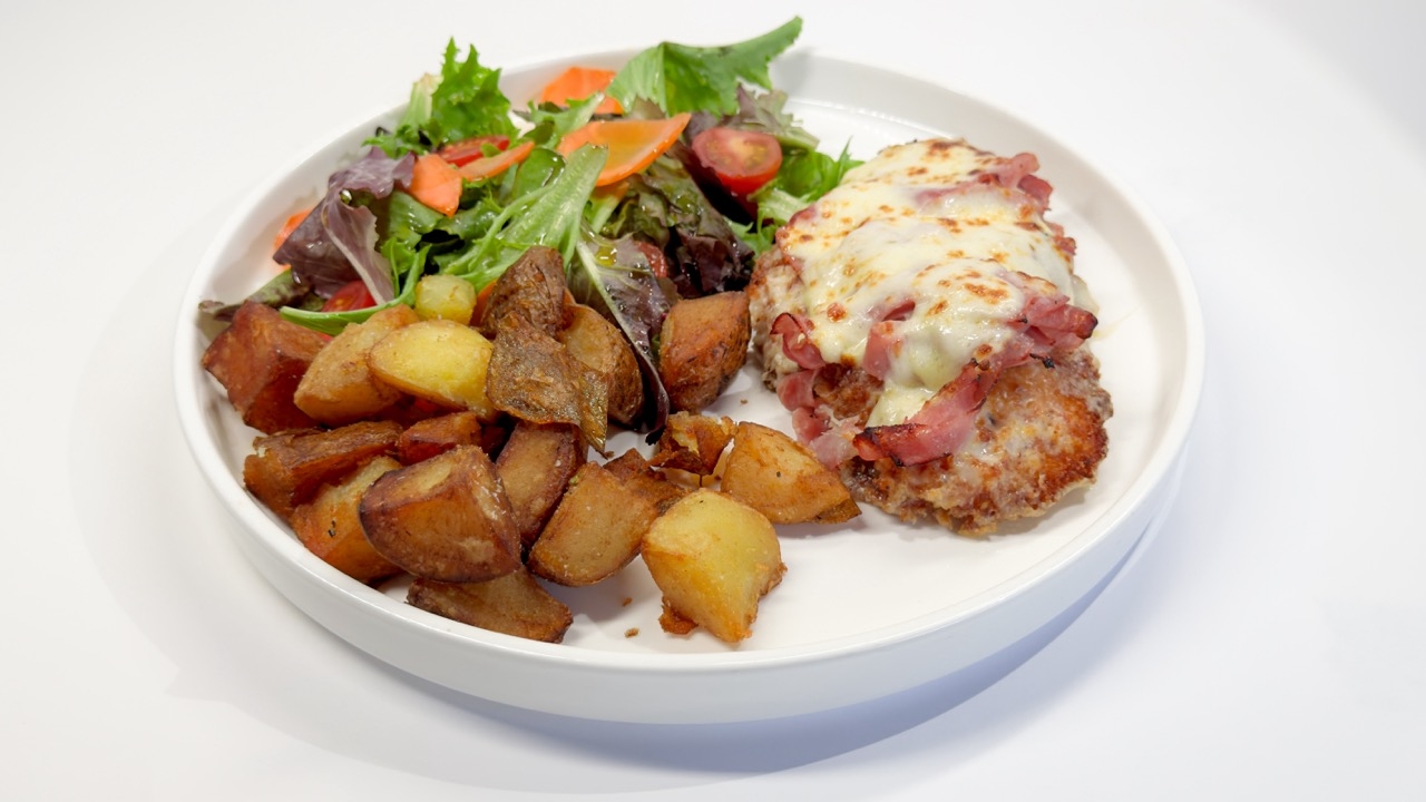 Chicken Milanese Alfredo with Ham.