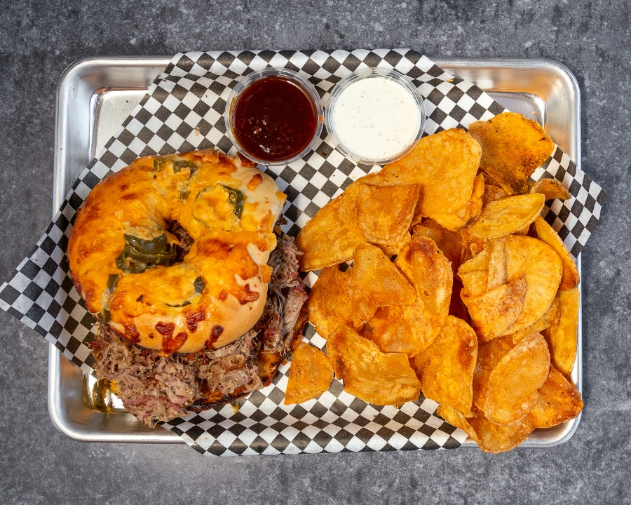 PULLED PORK SANDWICH w/TATER CHIPS.