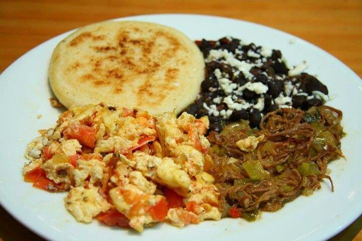 Venezuelan Breakfast (Arepa, egg, caraota, mechada, cheese).