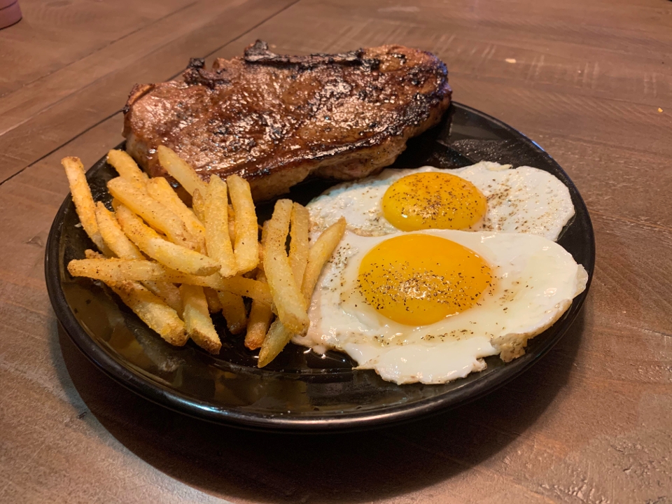 NY STRIP STEAK AND EGGS.