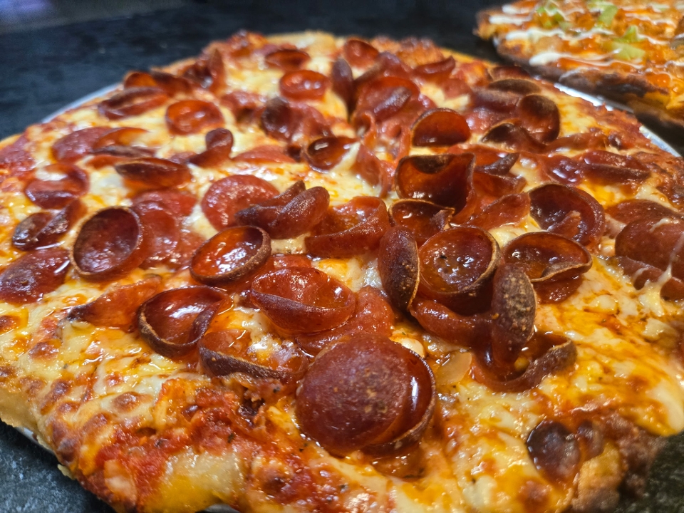 Small Pizza-1 Topping & 10 Boneless Wings.