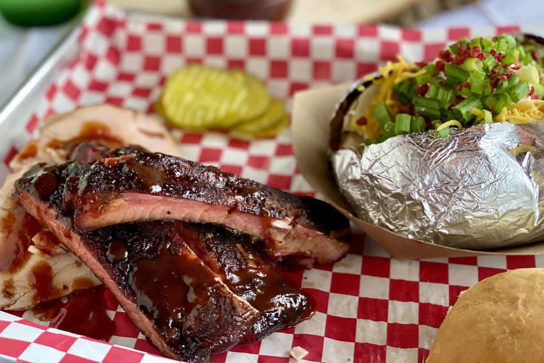 Pork Rib Plate with Overstuffed Potato.