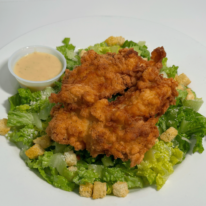 CAESAR SALAD W/ CRISPY CHICKEN.