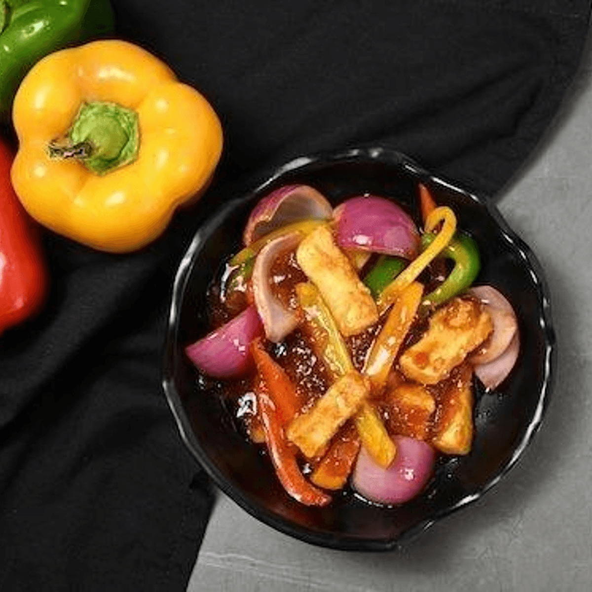 Three Peppered Chilli Paneer.