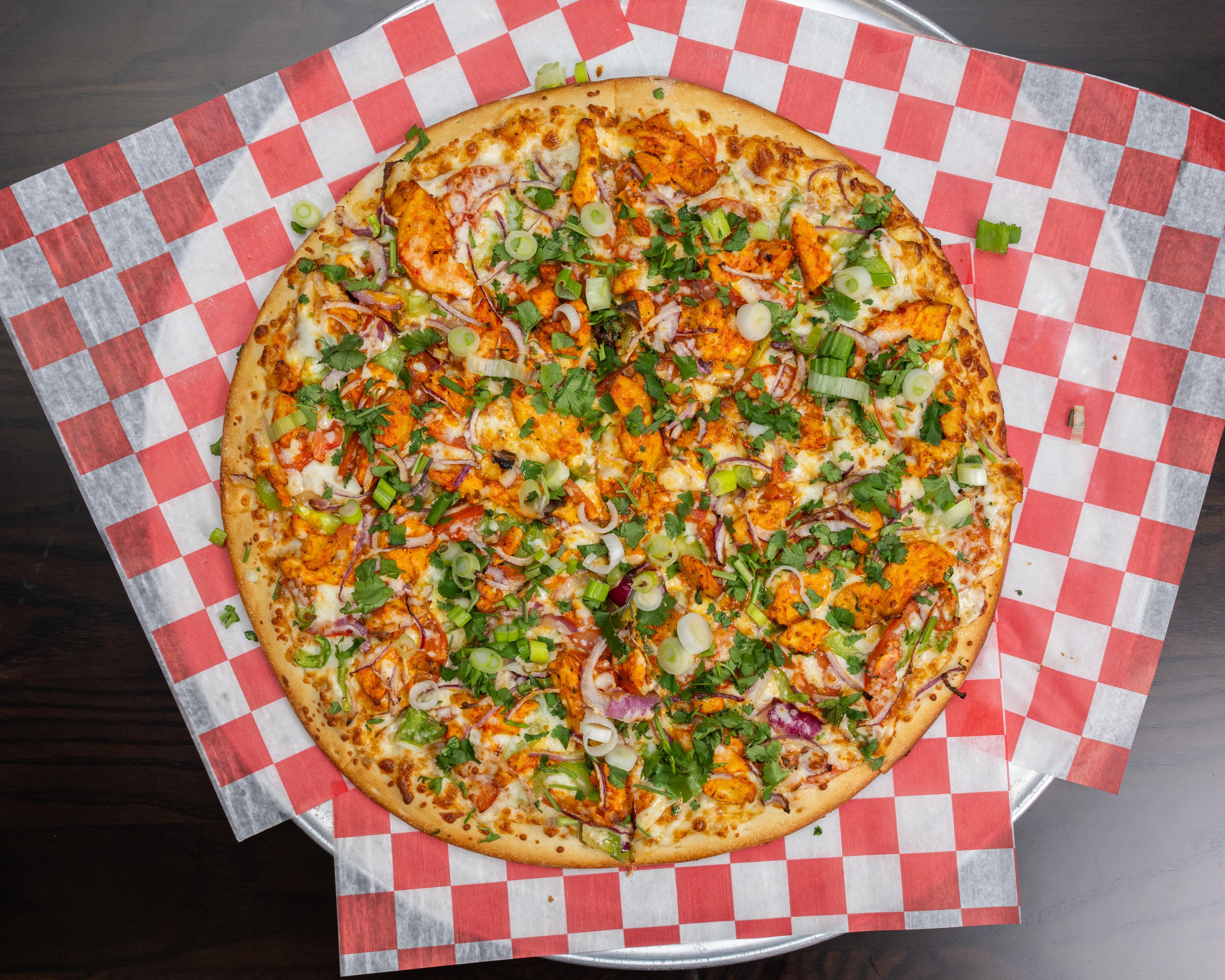 Small 12" Tandoori Chicken Pizza.