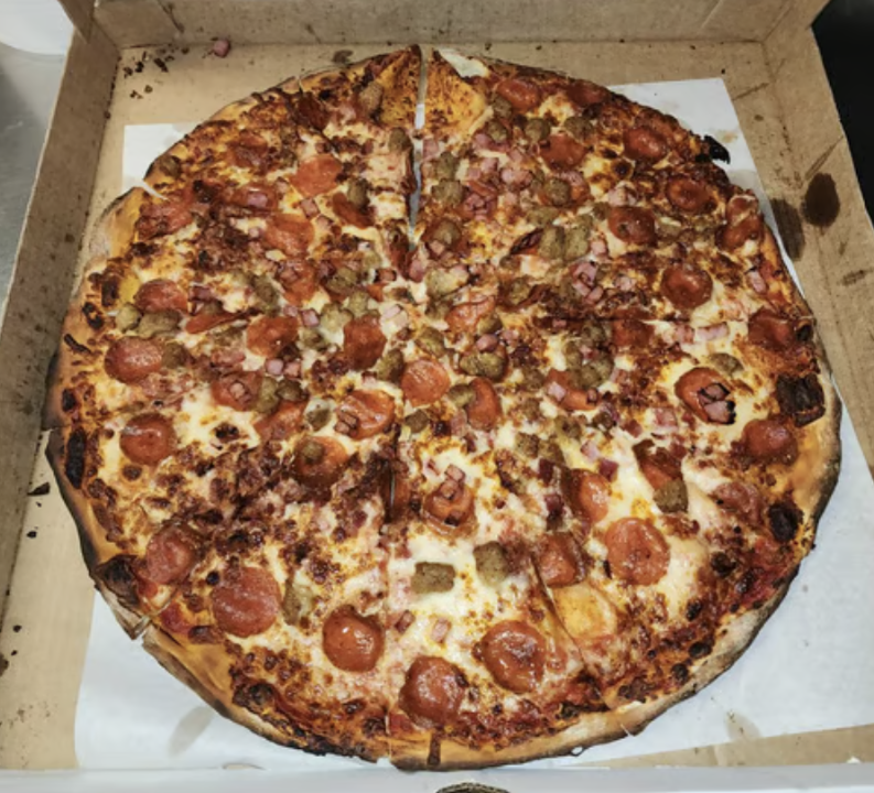 Full sheet Meat Market Pizza.