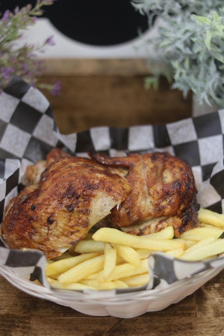 1/2 Rotisserie Chicken +2 Sides + 4 Sauce.