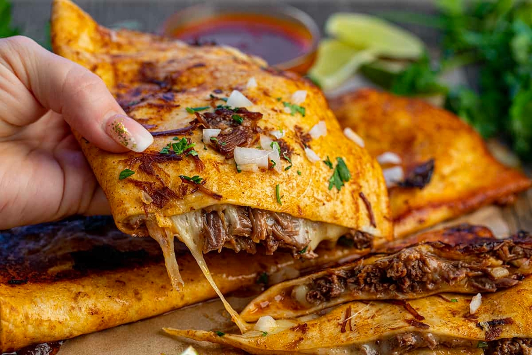 CHICKEN BIRRIA QUESADILLA.