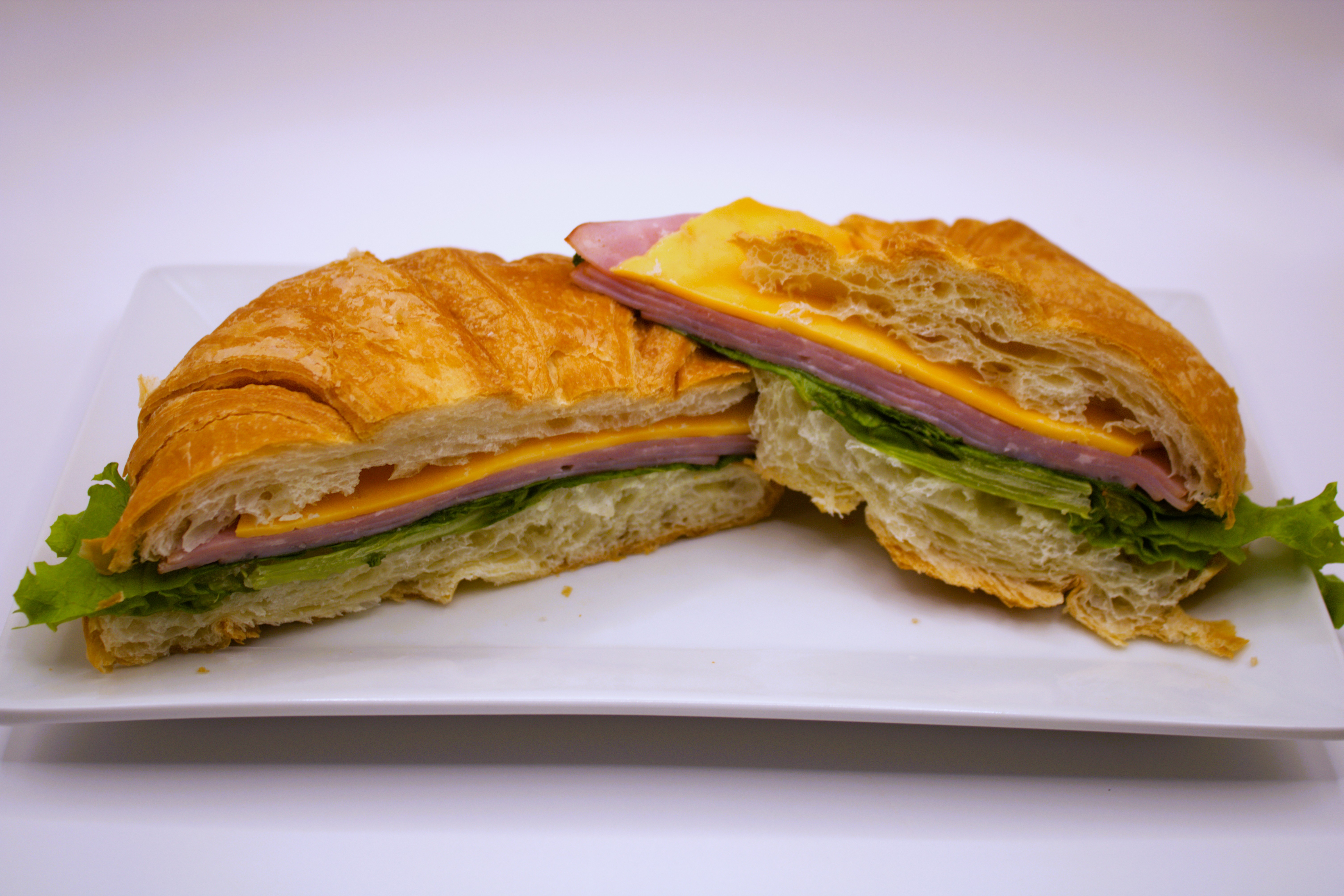 Ham & Cheddar Croissant Sandwich.