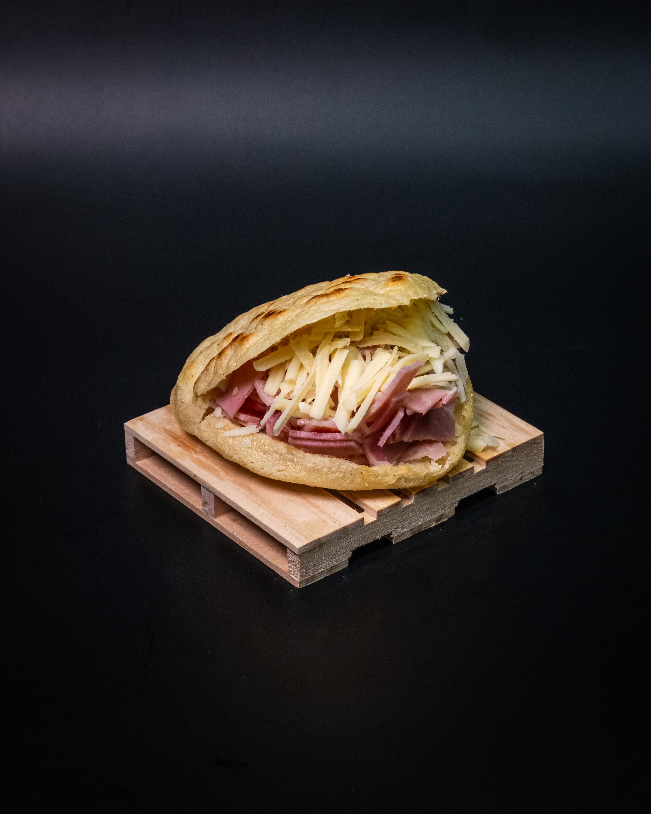 Ham & cheese arepa.