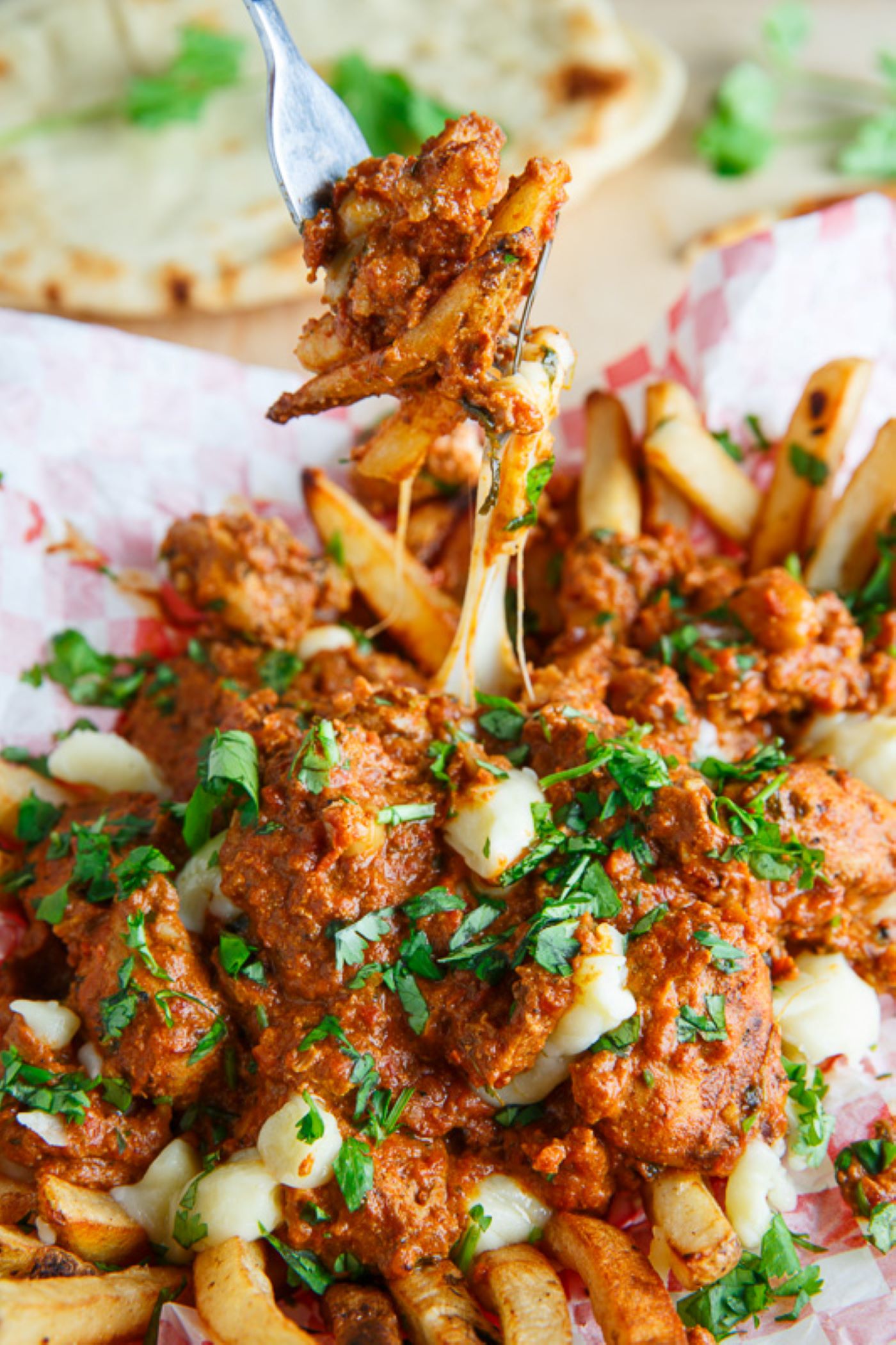 Butter chicken poutine
