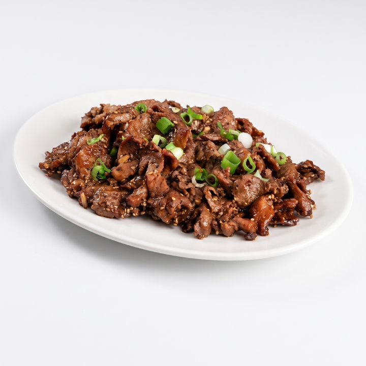 Bulgogi (Korean Soy Marinated Ribeye Steak) over White Rice.