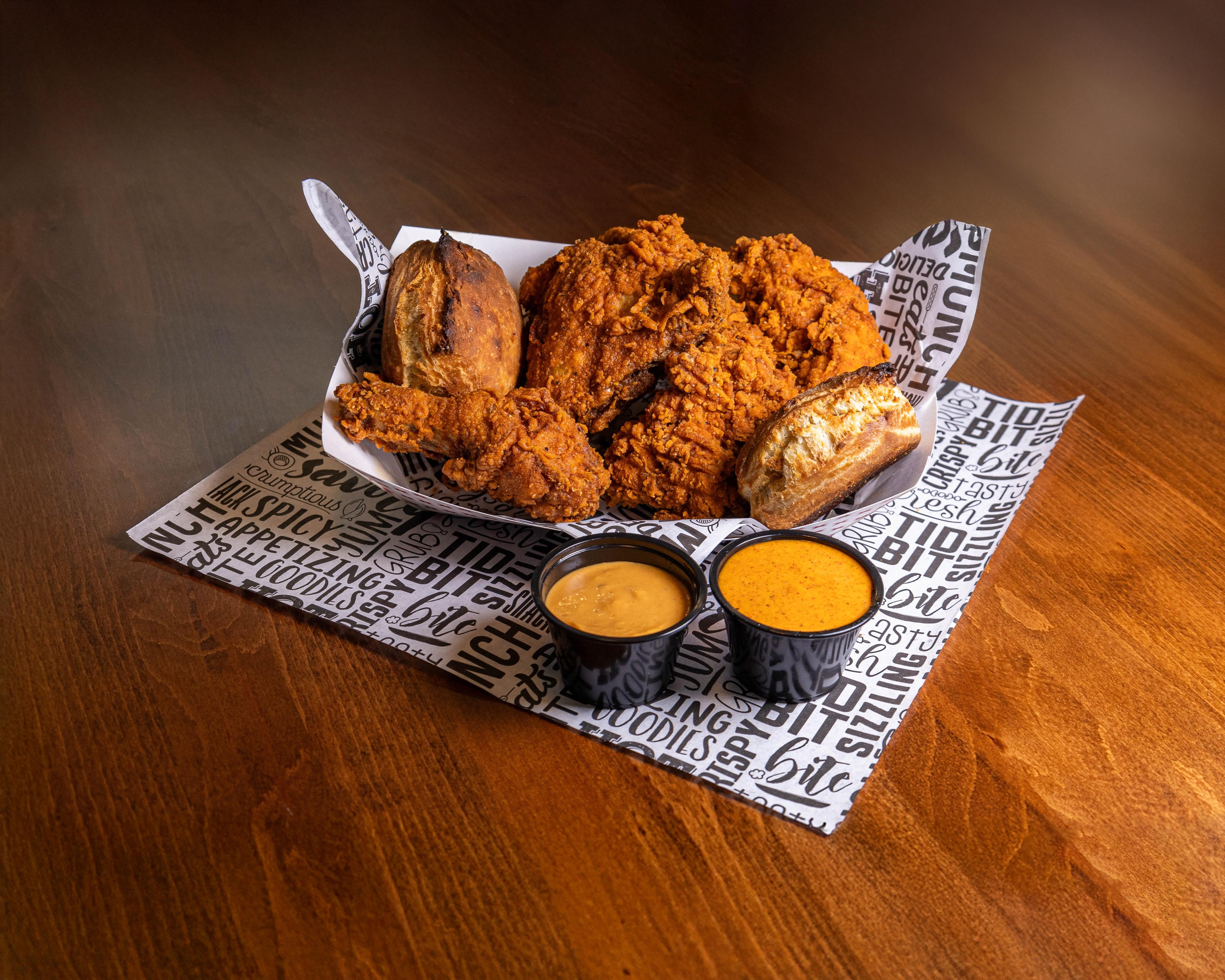 2 Pieces Tenders, 2 Piece Fried Chicken (Bone-In), 2 Sauces, 2 Rustic Butter Biscuits.