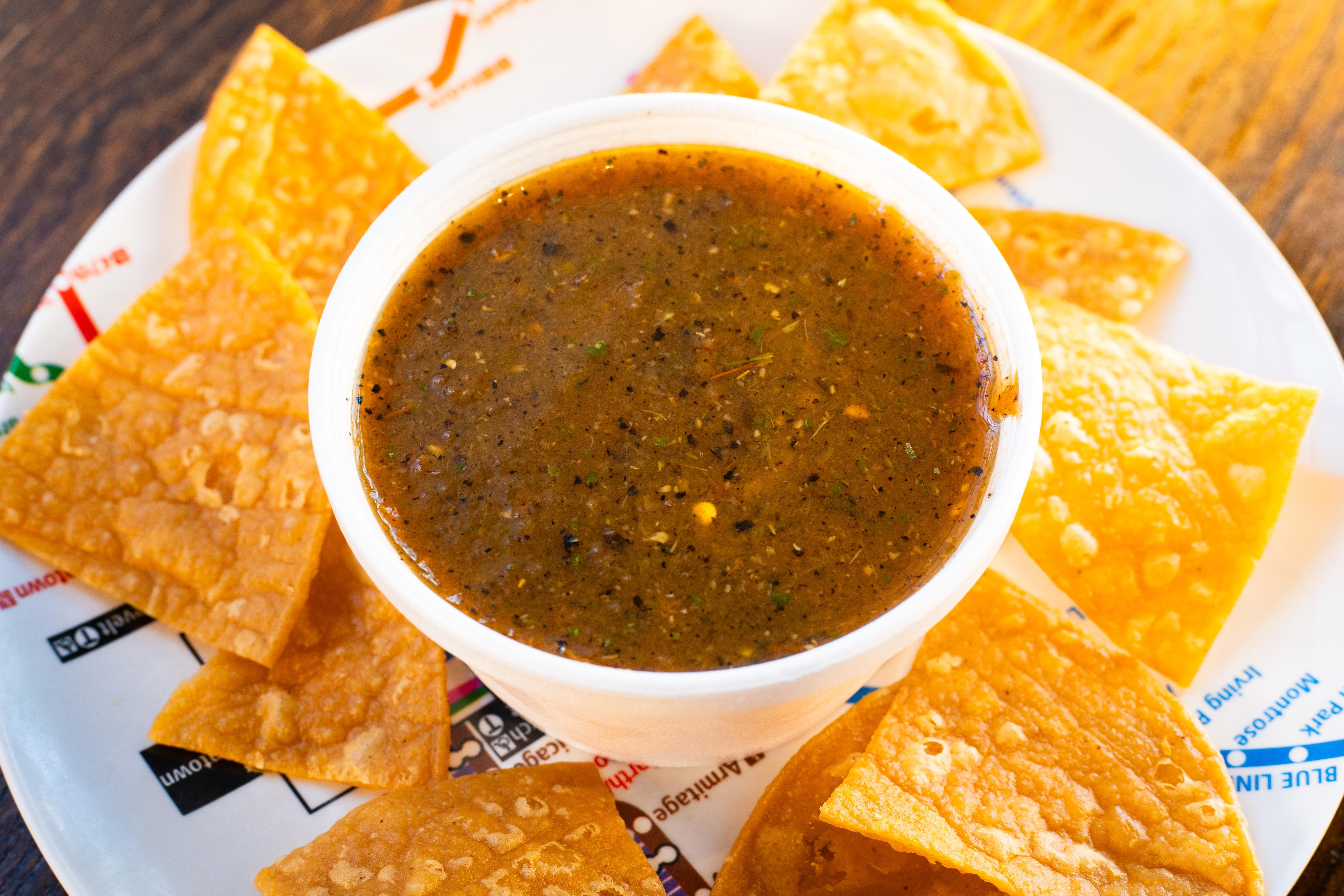 House Roasted Red Salsa & Hand-Cut Chips.