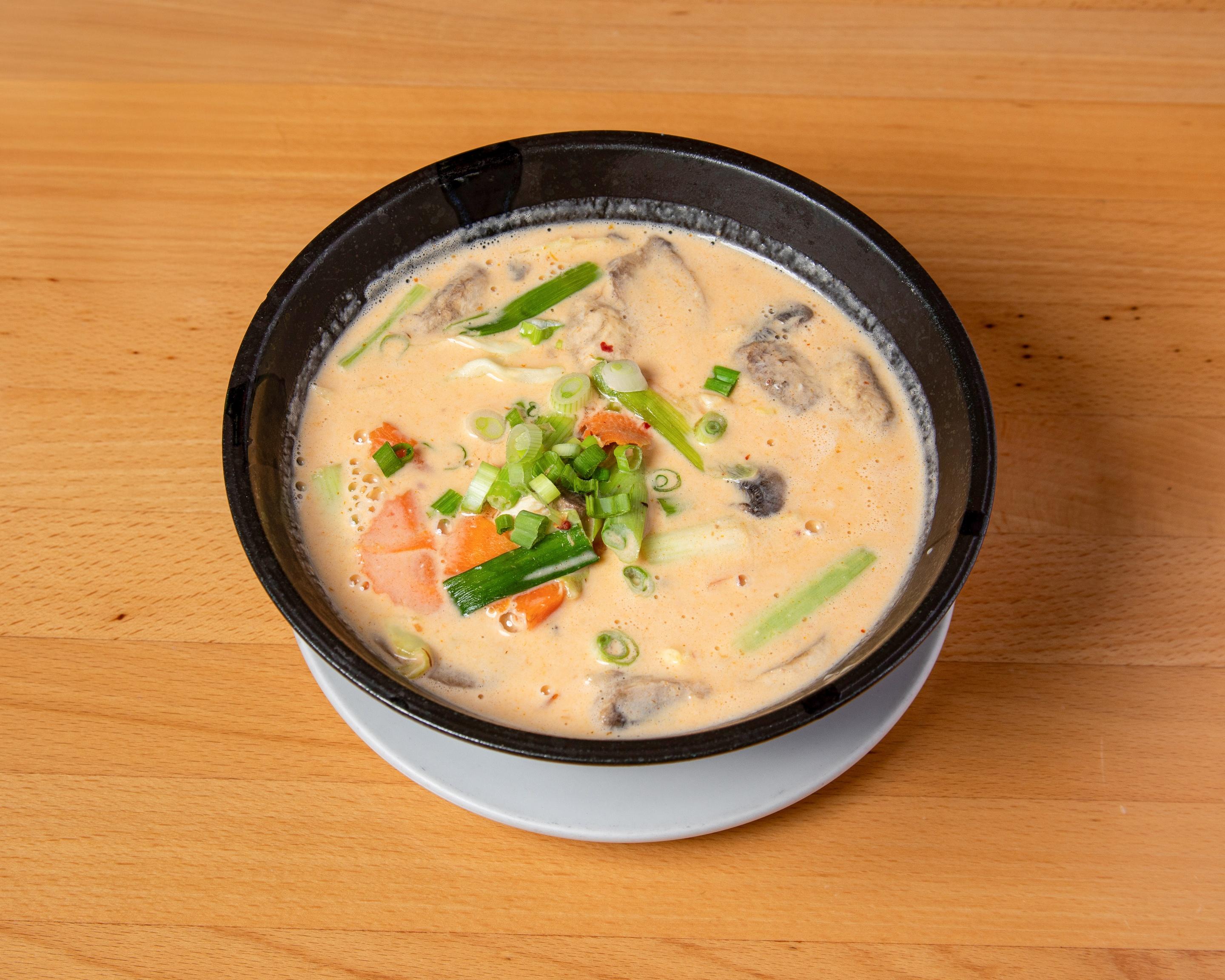 Tom Kha.