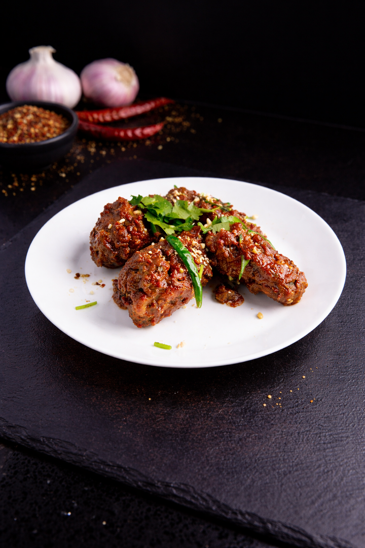 Karimnagar Kodi Wings (Spicy Chicken Wings, 8 pieces).