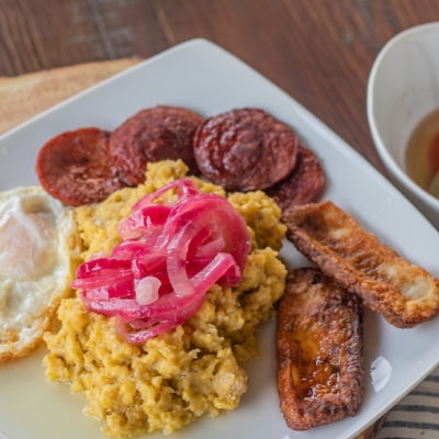 Mangú with fried Dominican cheese, salami & eggs any style.