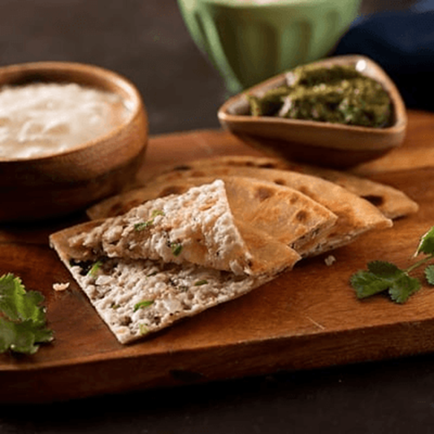 Paratha and Culcha (Tandoori-stuffed Bread and Leavened Bread).