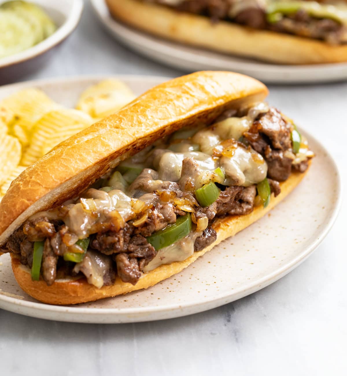 Philly Steak & Cheese Sub or Chicken Steak.