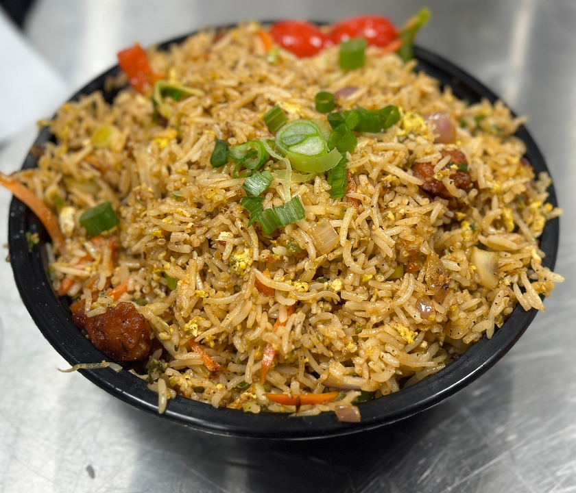 Schezwan Chicken Fried Rice.