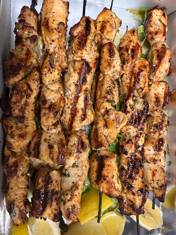 ATHENS Catering Combination choice HALF trays 1 protein, 1 salad, 1 side. Also included with this combination are 1 appetizer side tzatziki and  8 pitas cut at 6 at no extra cost.