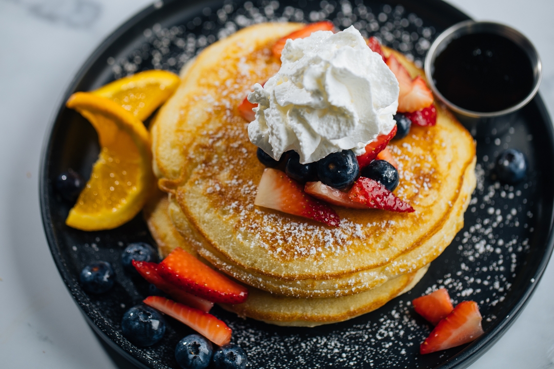 BUTTERMILK PANCAKE w/ MAPLE SYRUP.