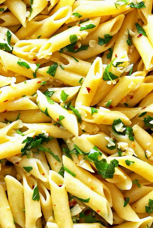 Pasta garnished with Herbs and Butter.