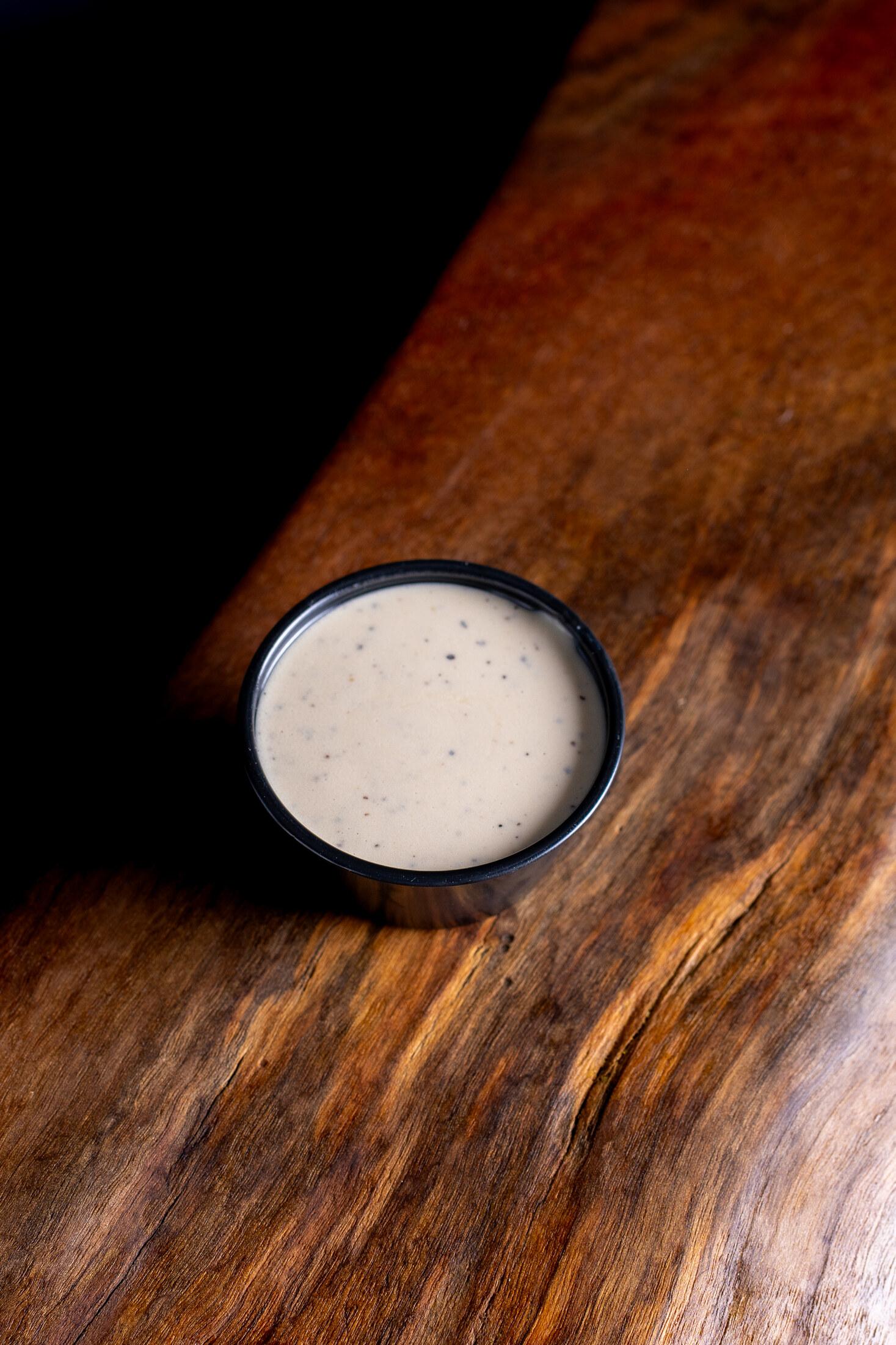 2 oz Caesar Dressing.