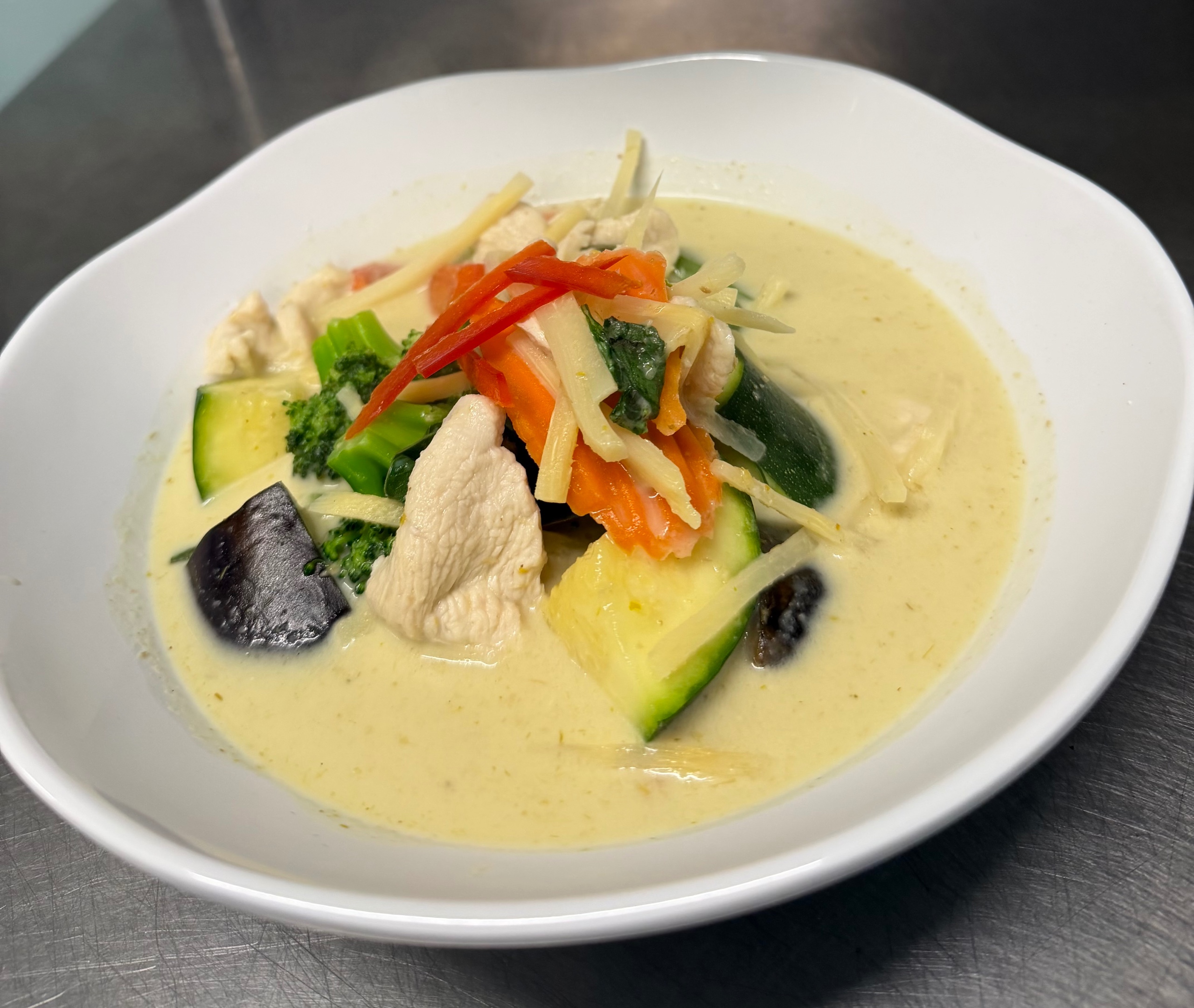 Green Curry Chicken Served with Jasmine Rice.