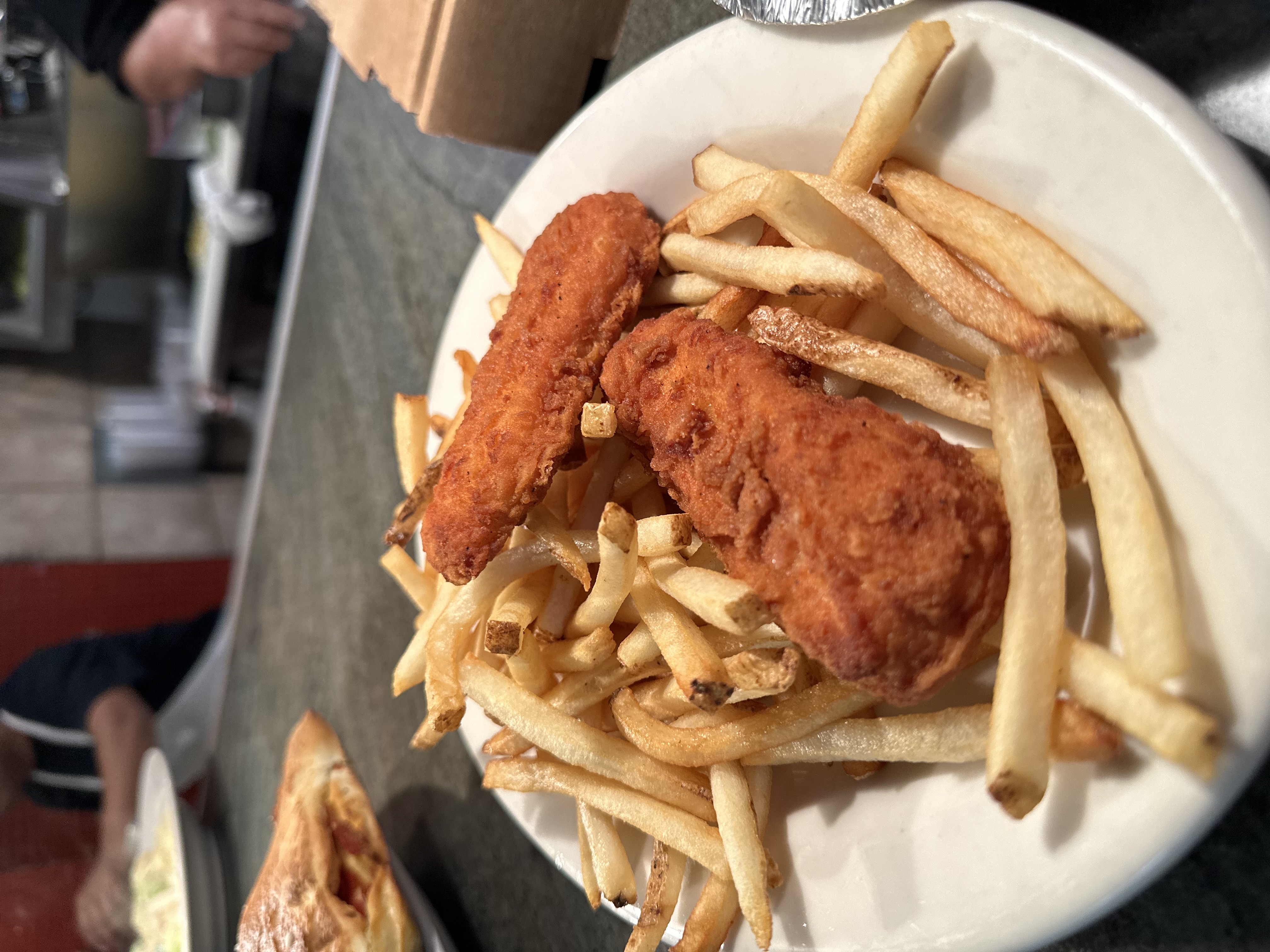 Kids 2 Chicken Tenders + Fries.